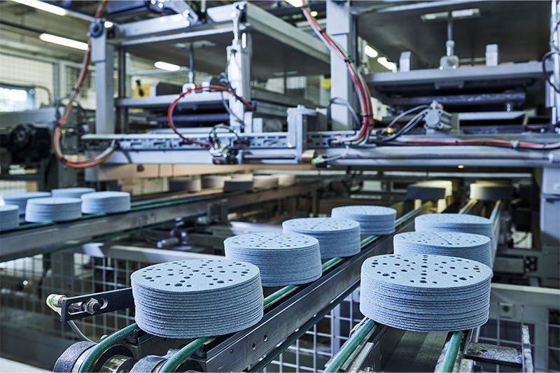 Hiomatarvikkeita liukuhihnalla